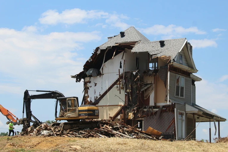 A building is being demolished adding to the construction waste